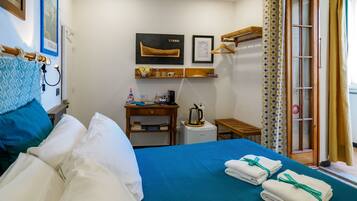 Room with desk and coat rail