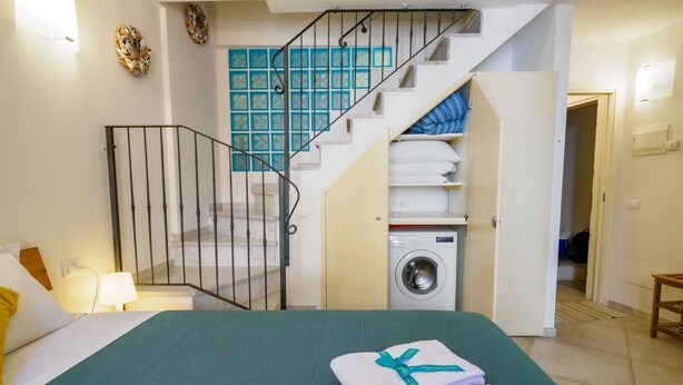 1 dormitorio, cuna de viaje, wifi gratis y ropa de cama
