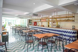 Breakfast, lunch, dinner served; local and international cuisine