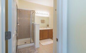 Combined shower/tub, hair dryer, towels, soap