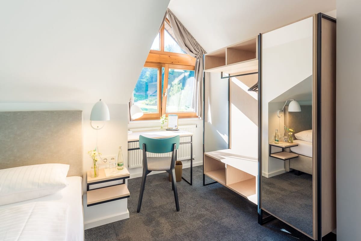 single room | living area | flat-screen tv