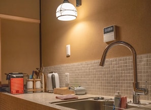 Fridge, microwave, cookware/dishes/utensils