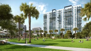 Residents enjoy a tranquil urban oasis with lush greenery and recreational activities at their doorstep.
