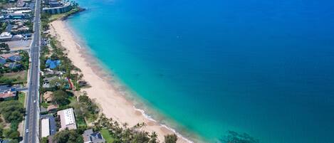 On the beach, sun loungers, beach towels