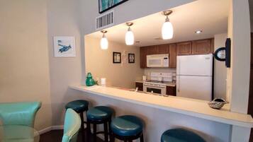 Condo, 2 Bedrooms | Private kitchen | Fridge, microwave, oven, dishwasher