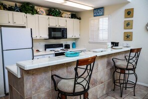 Condo, 2 Bedrooms | Private kitchen | Fridge, oven, coffee/tea maker, toaster - Morningbreeze 1302 2 Bedroom Condo by RedAwning (South Padre Island)