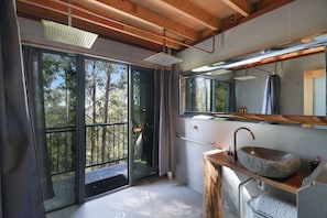 A modern bathroom with a stone sink, large windows, and a wooden ceiling. - TREE HOUSE #2. Private, Tri-level with Gold Coast Hinterland Views (Gold Coast)