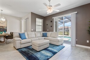 60-inch flat-screen TV with cable channels, Smart TV, Netflix - Four Bedroom Close to Disney w/ Screened Pool @StoreyLake 4910 (Kissimmee)