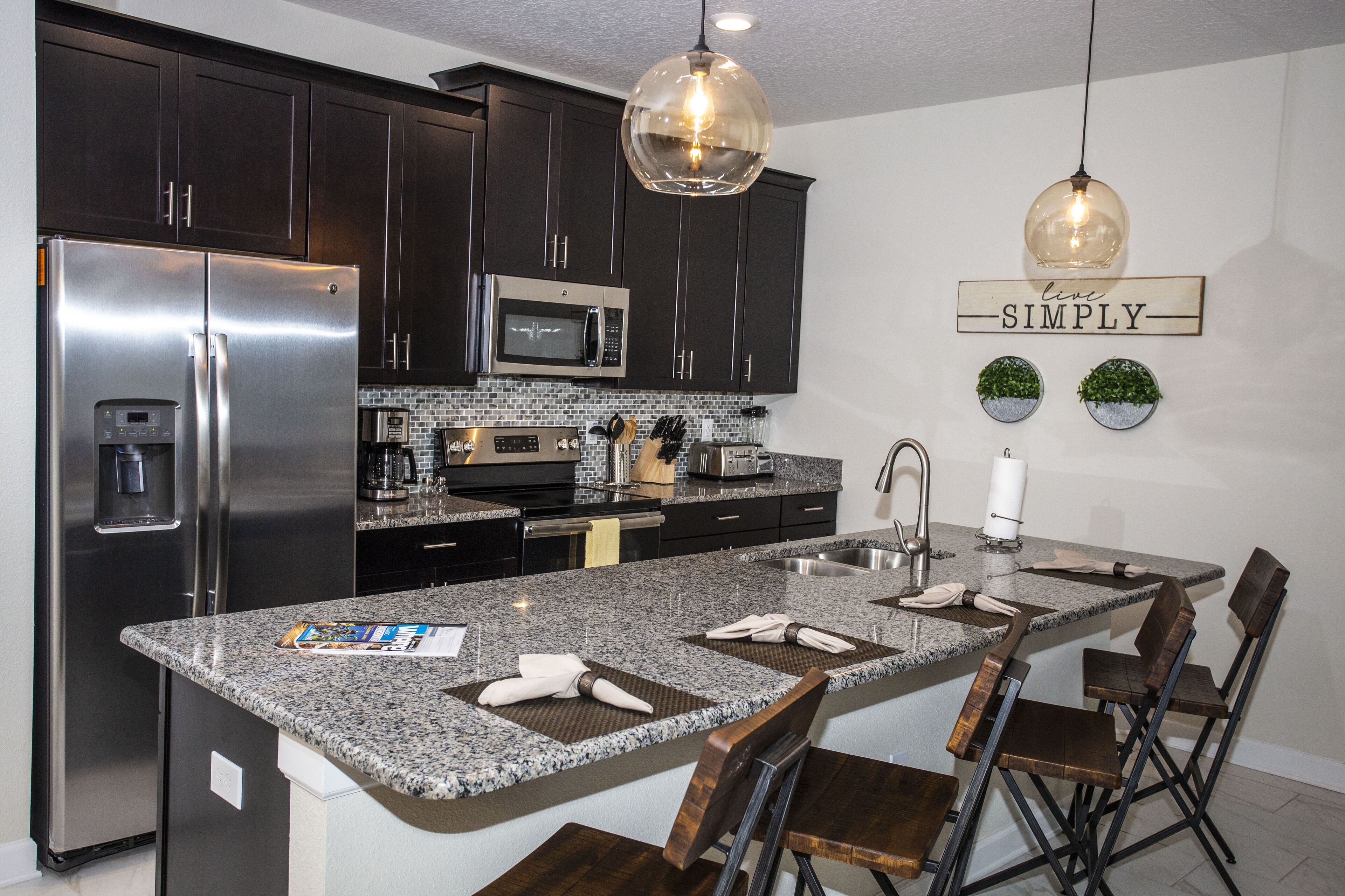 Townhome, 4 Bedrooms | Private kitchenette | Full-sized fridge, microwave, oven, stovetop