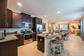 House, Multiple Bedrooms | Private kitchen | Full-size fridge, microwave, oven, stovetop