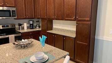 Townhome, 4 Bedrooms | Private kitchen | Full-size fridge, microwave, oven, stovetop