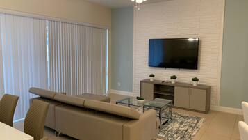 Townhome, 4 Bedrooms | Living area | 60-inch Smart TV with cable channels, TV, Netflix