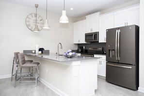 Townhome, 5 Bedrooms | Private kitchen