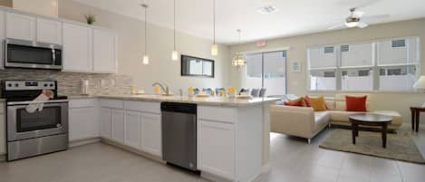 Townhome, 4 Bedrooms | Private kitchen | Full-size fridge, microwave, oven, stovetop