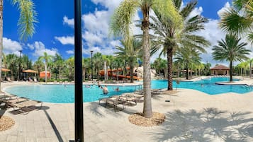 Outdoor pool, pool loungers, lifeguards on site