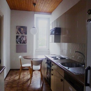 Fridge, oven, dining tables