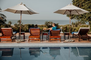 Outdoor pool, pool umbrellas, pool loungers