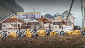 A hotel under construction with a signboard advertising hotel, kitchen, and chophouse services. - The Delta Falls Hotel (Nyahururu)