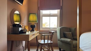A room with a desk, chair, bed, and a window with a view. - East Beach Guest House (Littlehampton)