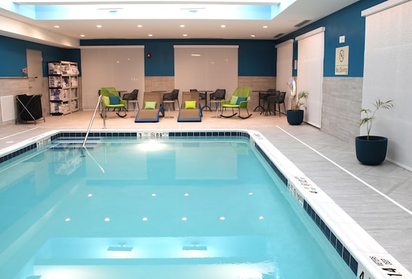 Indoor pool, open 9:00 AM to 10:00 PM, pool loungers