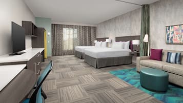 Premium bedding, desk, laptop workspace, blackout drapes