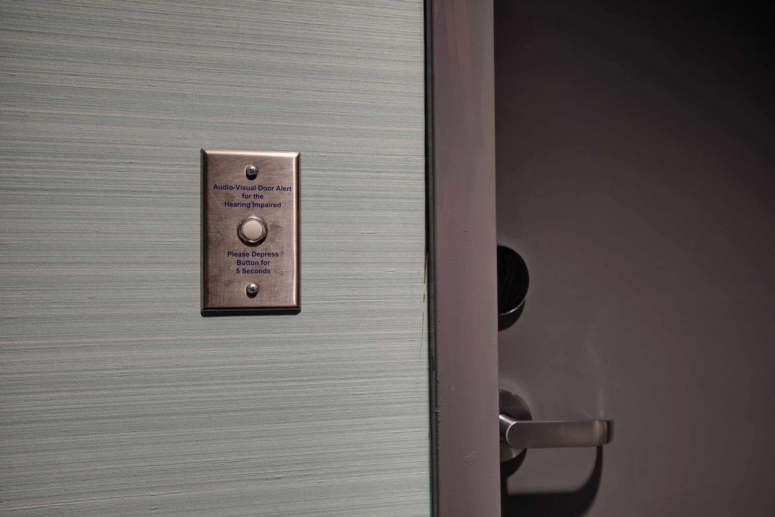 hypo-allergenic bedding, desk, laptop workspace, blackout curtains