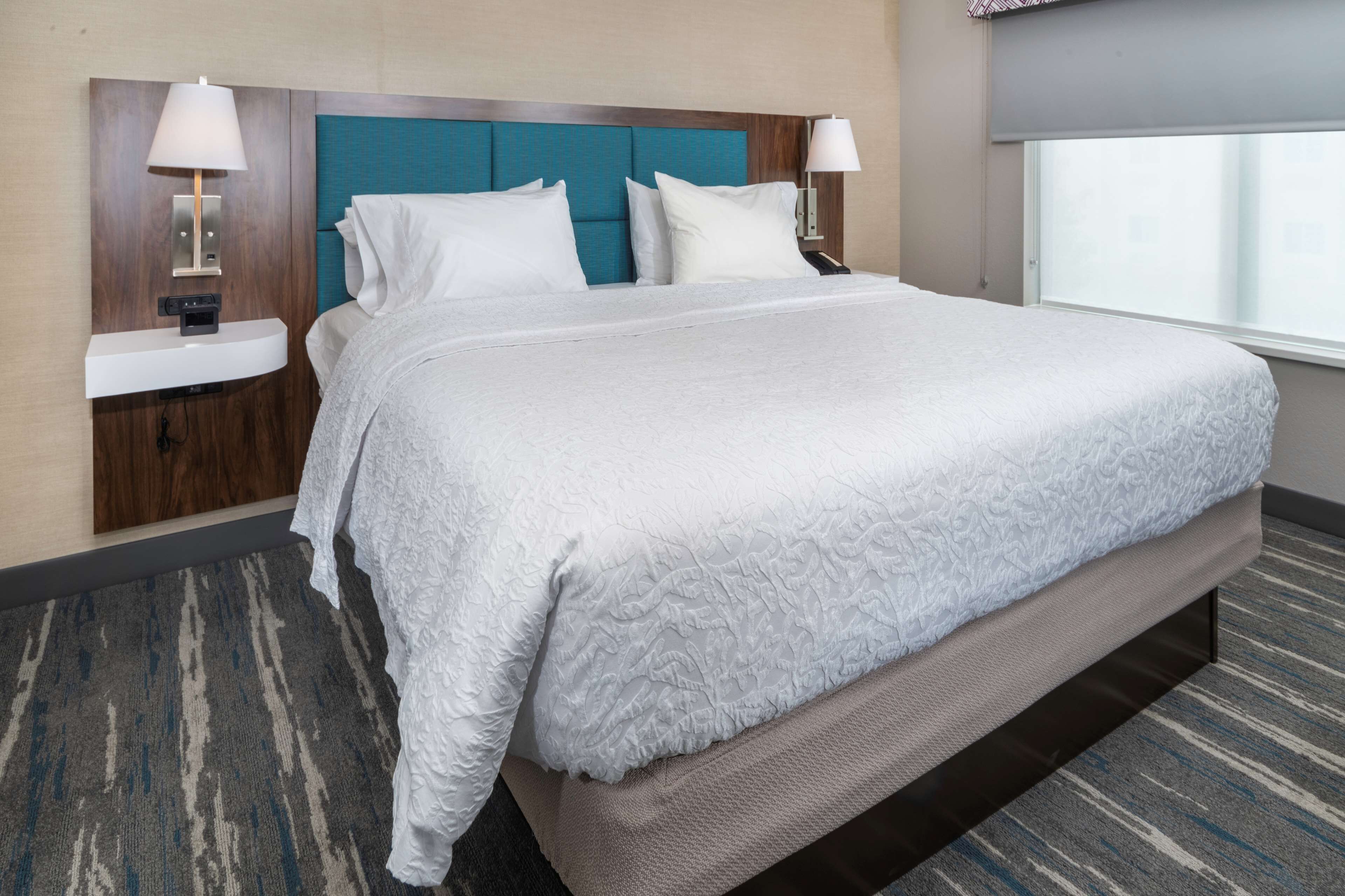 desk, laptop workspace, blackout curtains, iron/ironing board