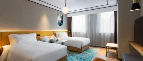 Habitación, 2 camas individuales | Ropa de cama de alta calidad, edredón y artículos del minibar gratis