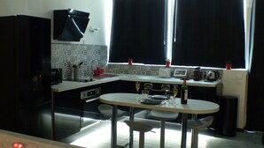 Coffee/tea maker, fridge, microwave, oven