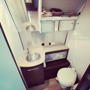 Shower, shampoo, toilet paper