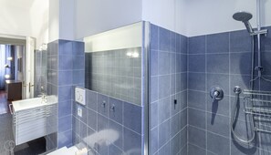 Shower, designer toiletries, hair dryer, bidet