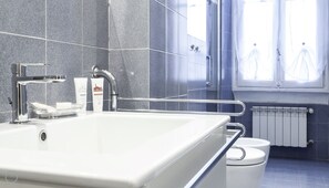 Shower, designer toiletries, hair dryer, bidet