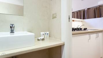 Shower, free toiletries, hair dryer, children's dressing gowns