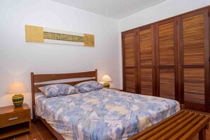 1 bedroom, desk, iron/ironing board, travel crib