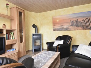 Ferienhaus | Wohnzimmer | Kamin