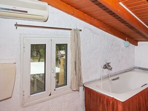 Apartment | Bathroom | Shower, towels - Restful Apartment in Istiaia With Patio (Istiaia-Aidipsos)