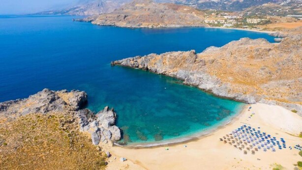 A coastal landscape with a beach, rocky outcrops, and a clear blue sea. - Splendid Holiday Home With Swimming Pool (Rethymno)