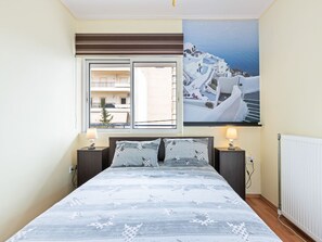 Departamento | 1 habitación, tabla de planchar con plancha y ropa de cama 