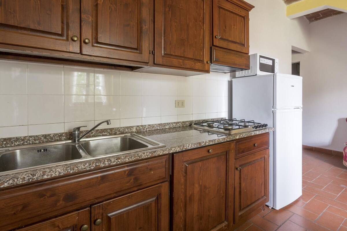 Casa | Cocina privada | Cafetera de espresso, refrigerador y periquera