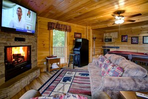 Cabin, Multiple Beds, Hot Tub | Living area | 42-inch flat-screen TV with cable channels, TV, fireplace - Belvedere (Sevierville)