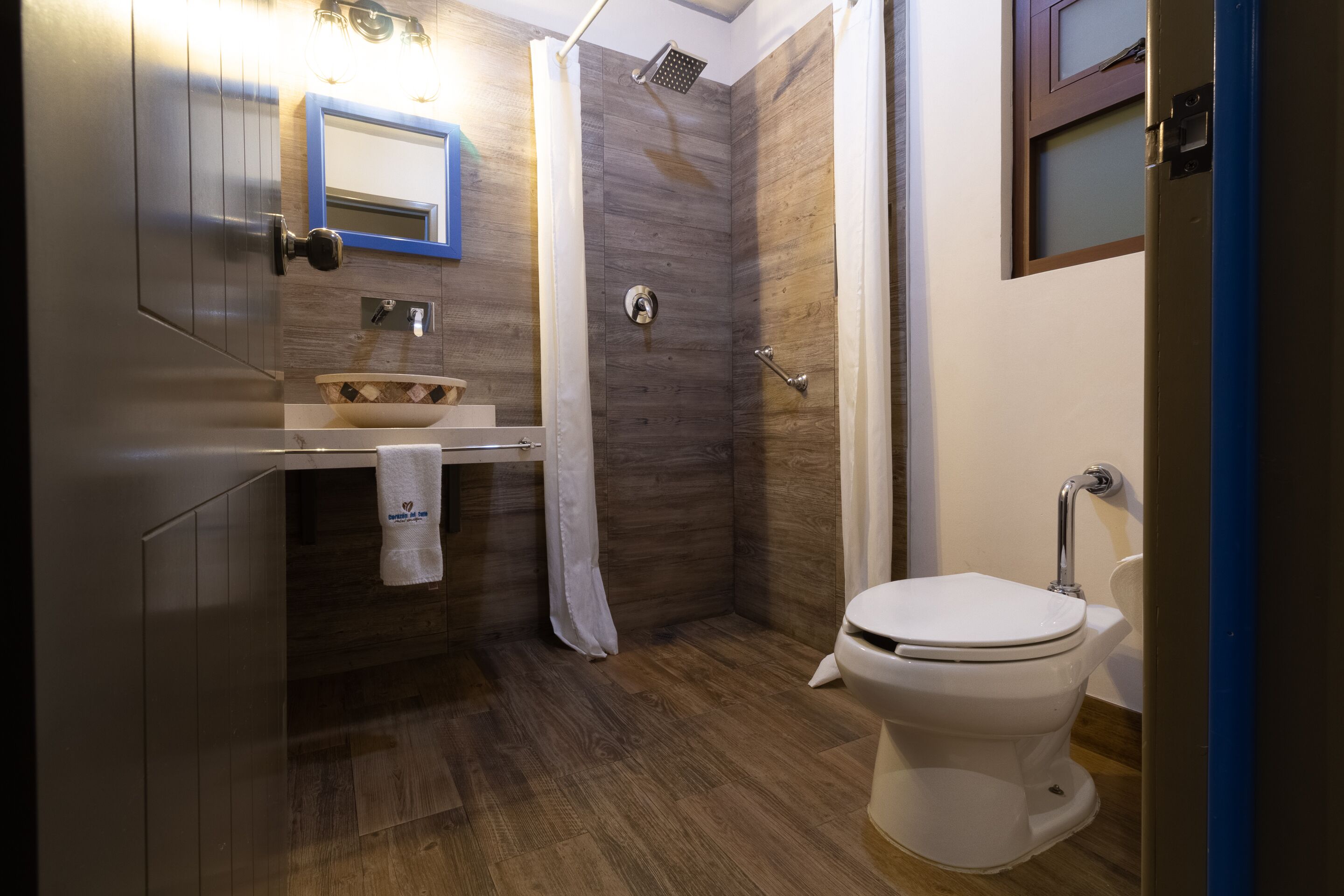 standard room (two beds) | bathroom | shower, free toiletries, hair dryer, towels