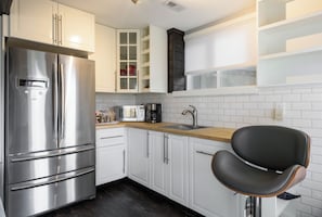 Fridge, microwave, stovetop, coffee/tea maker
