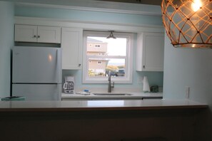 Condo, 2 Bedrooms | Private kitchen - Boardwalk A8 by Surfside VR (Pensacola Beach)