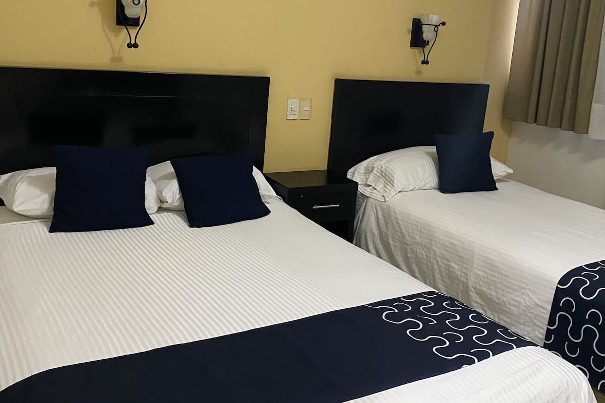 Standard Triple Room (1 queen bed) | Desk, free WiFi, bed sheets