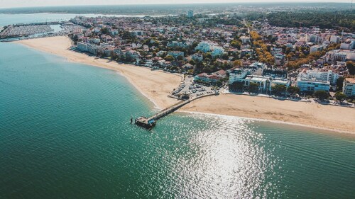 Poolside Escape by Arcachon