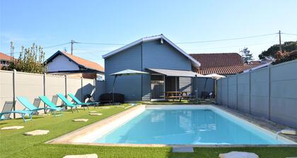 Poolside Escape by Arcachon