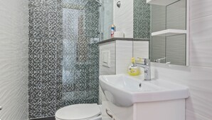 Apartamento | Banheiro | Secador de cabelo 