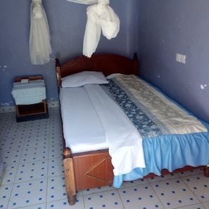 Desk, blackout curtains, bed sheets