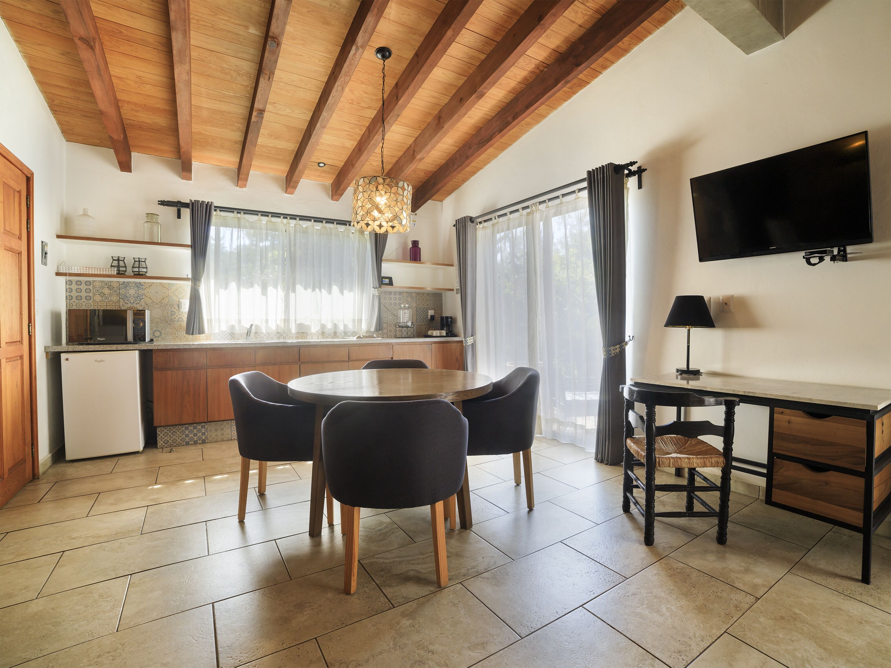 superior suite, 1 queen bed with sofa bed, jetted tub | living area | 32-inch tv with satellite channels, netflix, streaming services