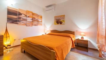 2 habitaciones, tabla de planchar con plancha y ropa de cama